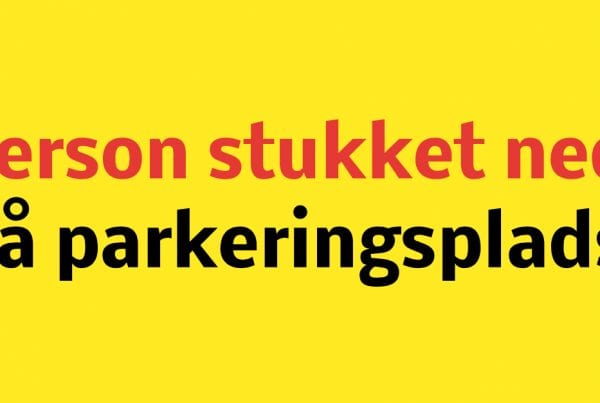 Person stukket ned på parkeringsplads