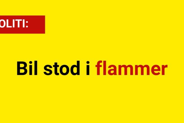 Bil stod i flammer