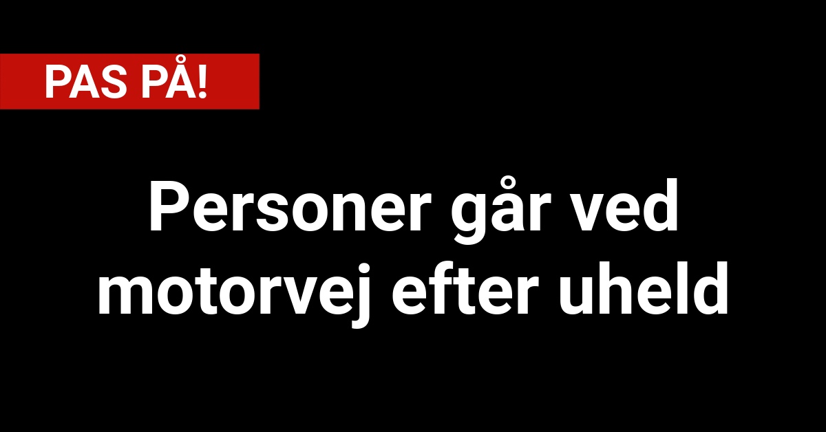 PAS PÅ! Personer går ved motorvej efter uheld