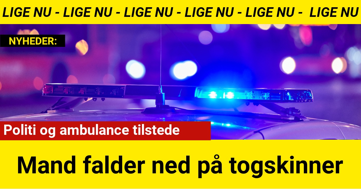 Mand falder ned på togskinner