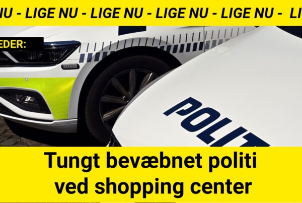 Tungt bevæbnet politi ved shopping center