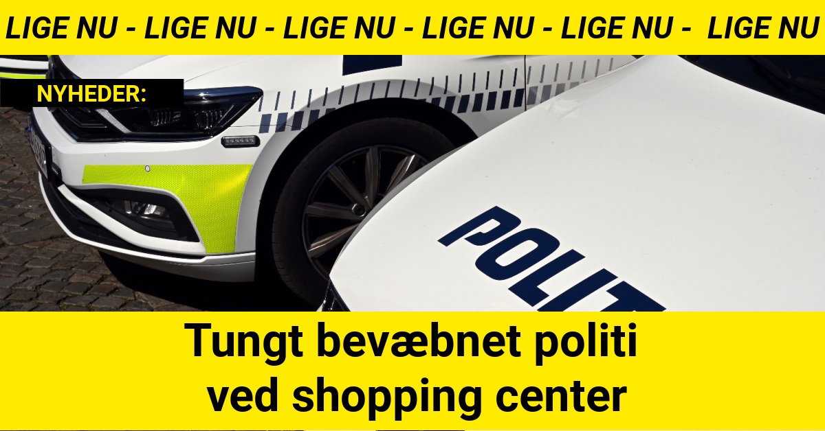 Tungt bevæbnet politi ved shopping center