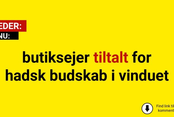 butiksejer tiltalt for hadsk budskab i vinduet